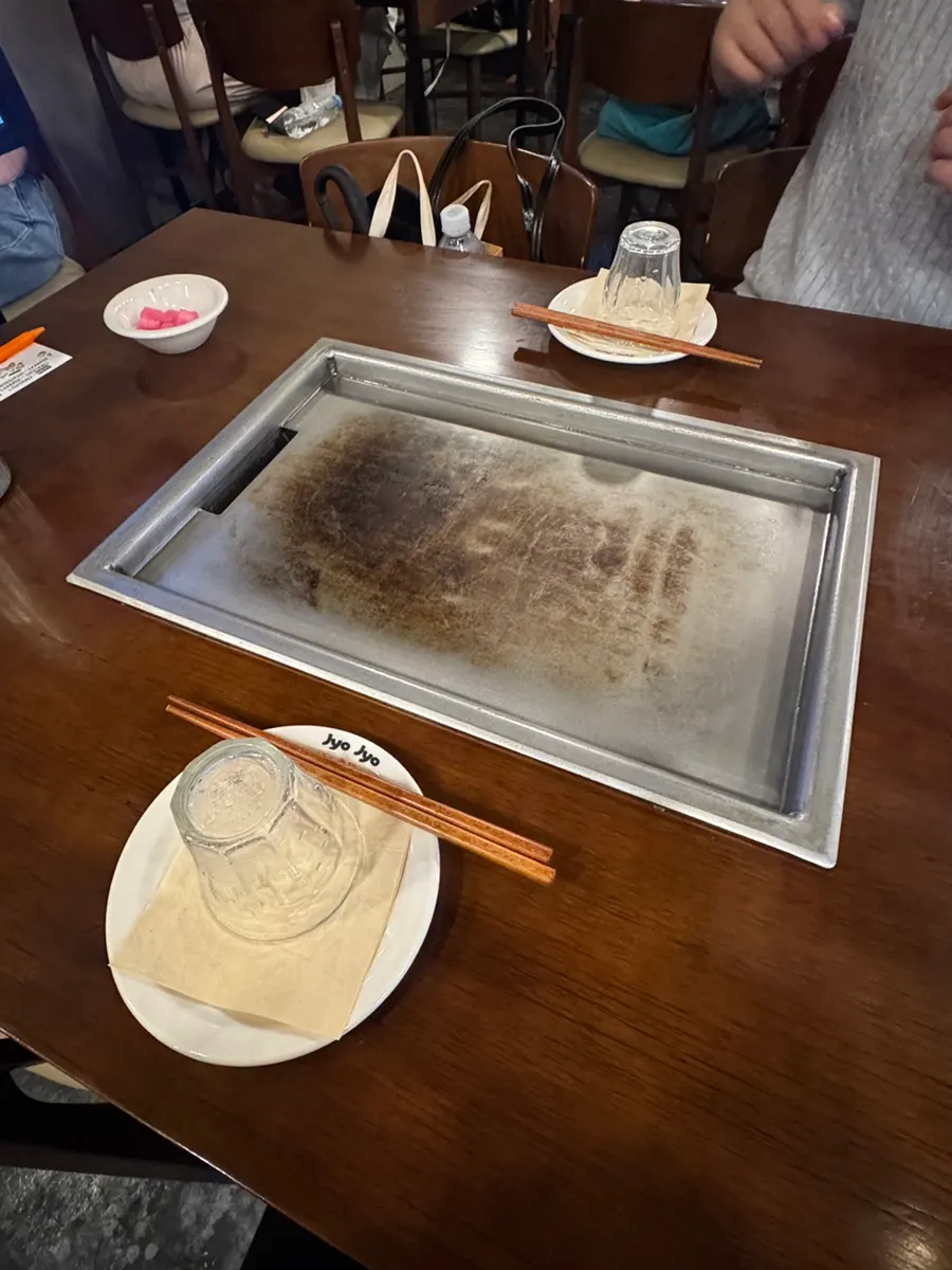 Table with a built-in hot plate at Jojo Mullae Branch