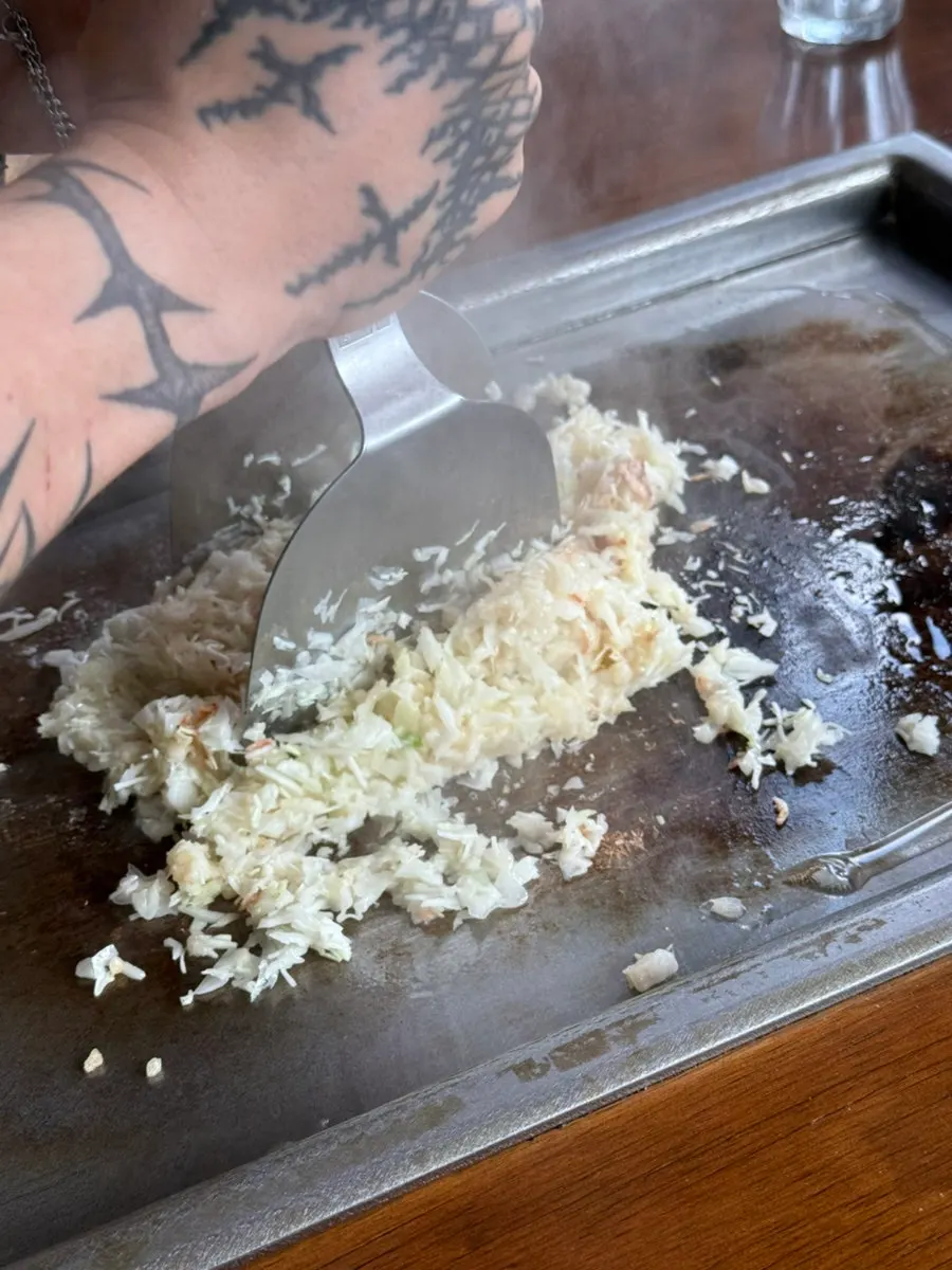 Mentaiko monjayaki topped with mozzarella cheese and mochi