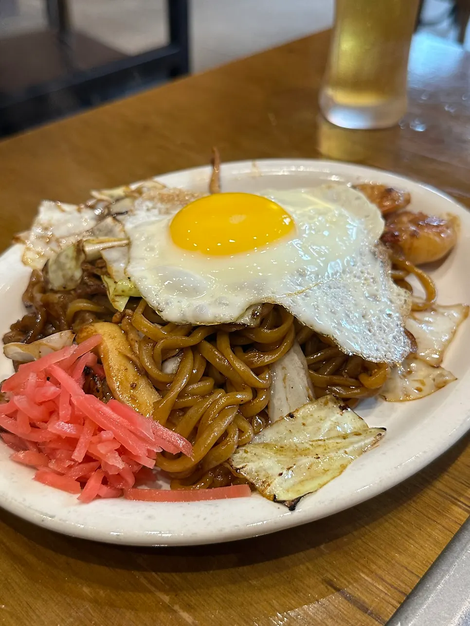 Jojo's yakisoba topped with a fried egg