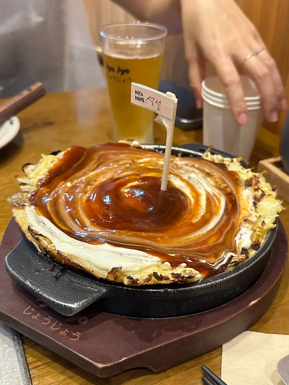 Jojo's okonomiyaki served on the griddle