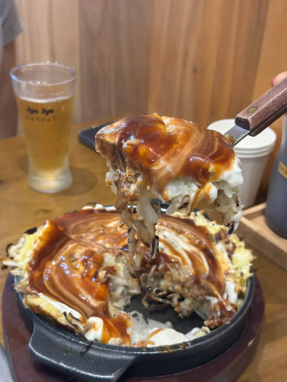 A piece cut from the okonomiyaki
