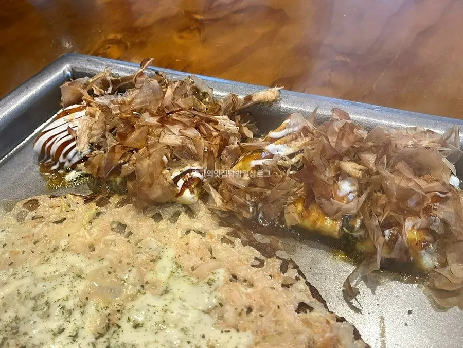 철판 조리 과정이 보이는 자리