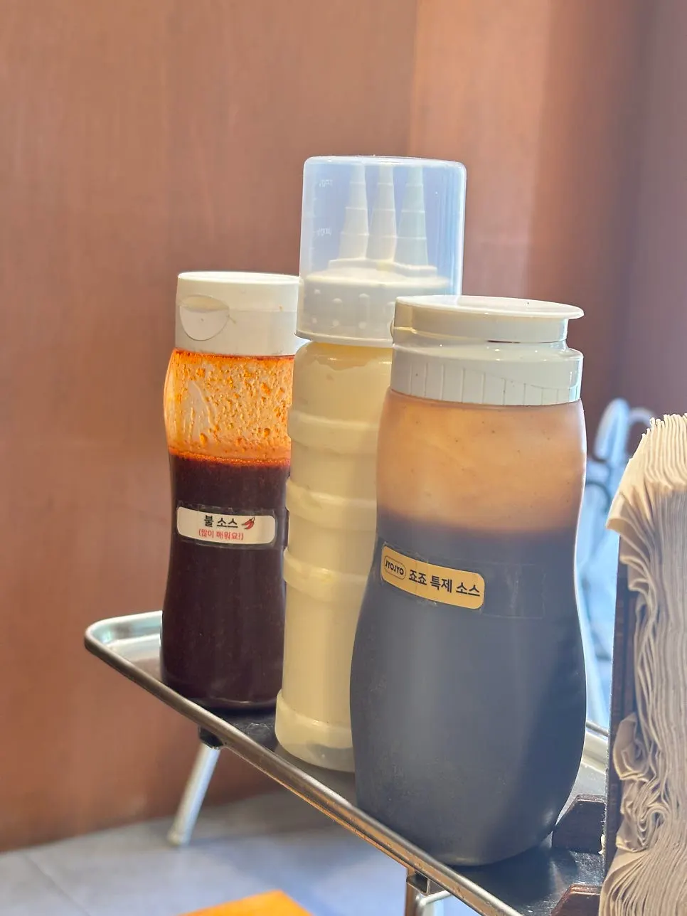 Extra sauces set out on the table