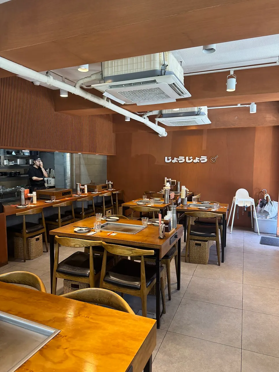 Seats with built-in griddles at Jojo Yeonnam Branch