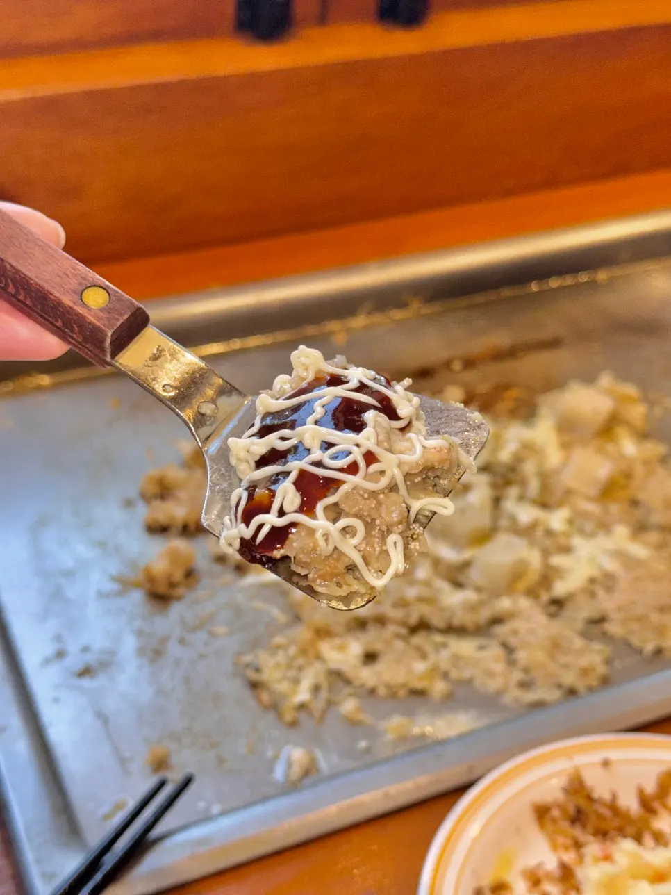 A spatula-full bite of monjayaki
