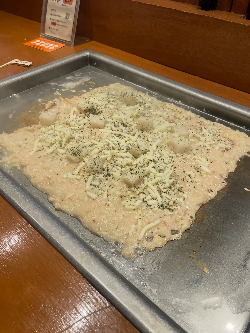 Jojo's menu featuring monjayaki and yakisoba