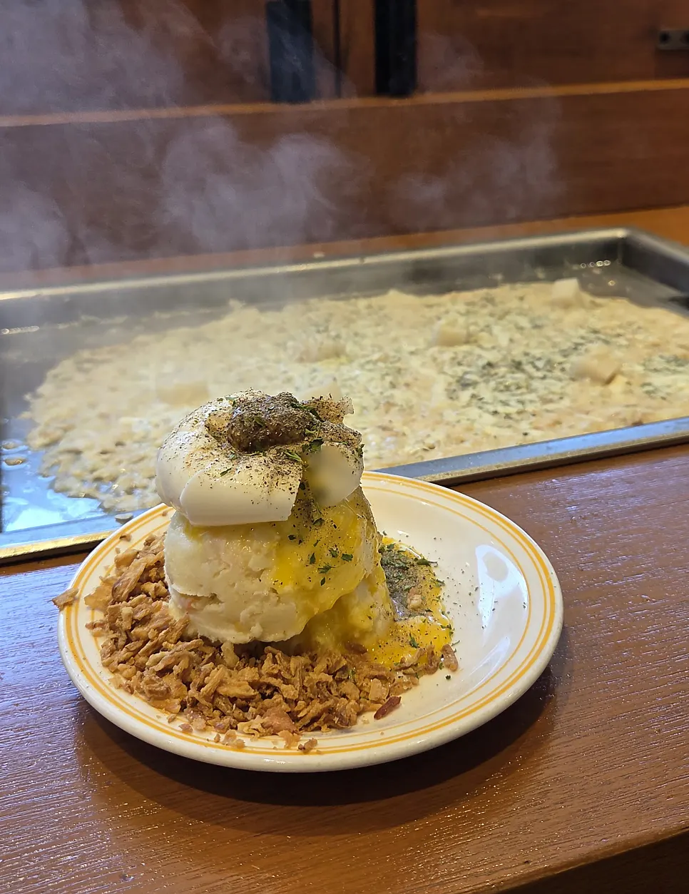 Volcano potato topped with soft-boiled egg and cheese