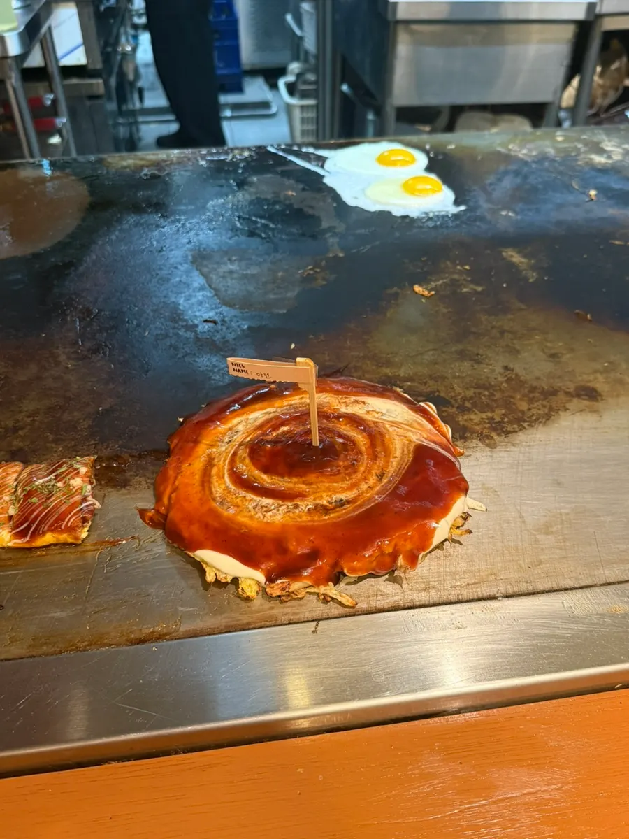 Jojo signature okonomiyaki with added cheese