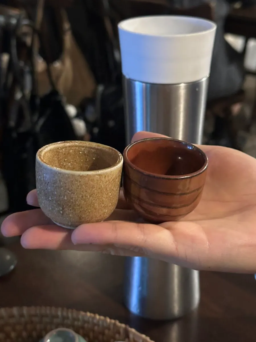 Traditional liquor glasses in various colors and patterns