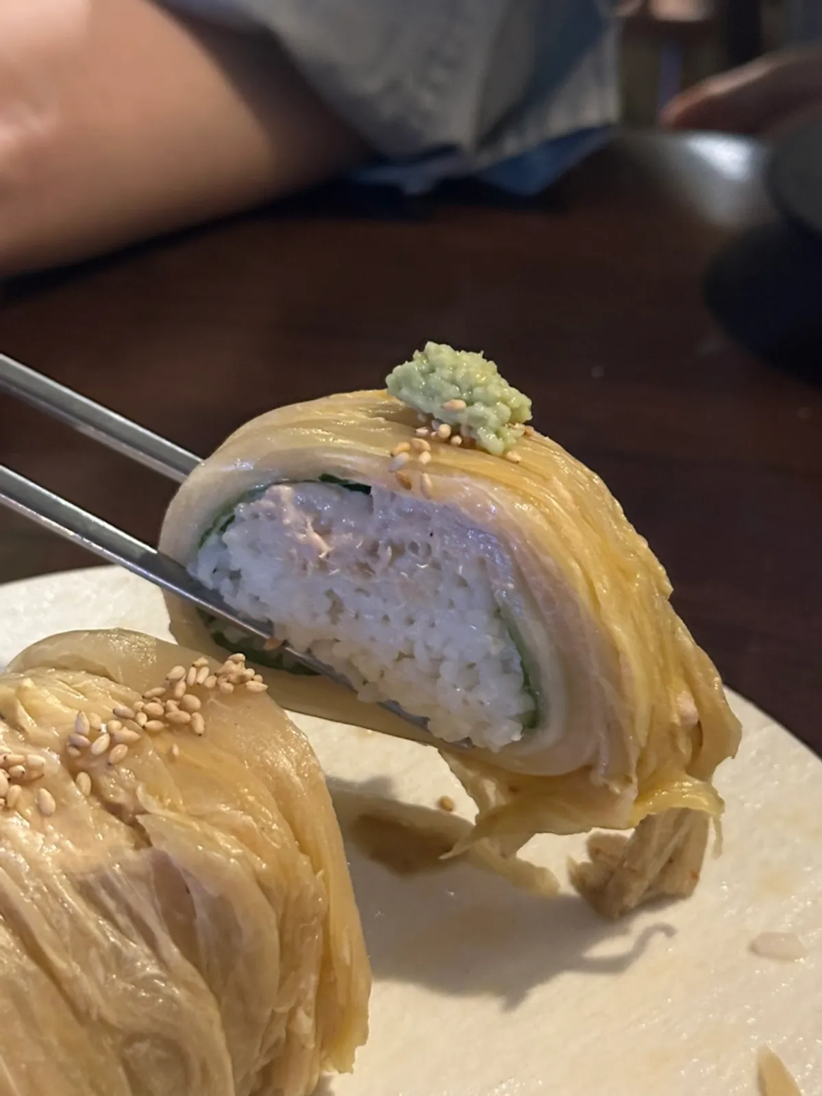 Cross-section of the kimchi rolls with perilla leaf and tuna