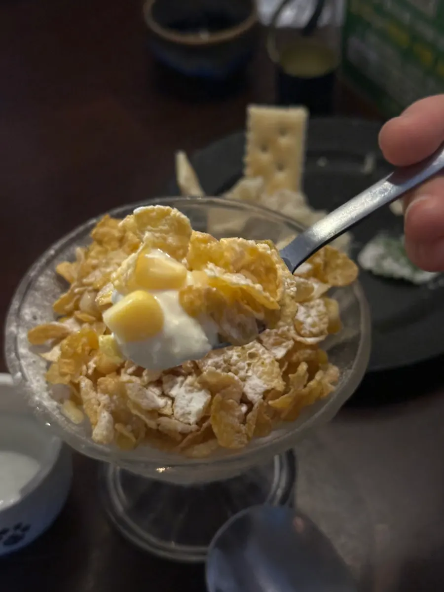 Corn ice cream topped with corn kernels and cereal