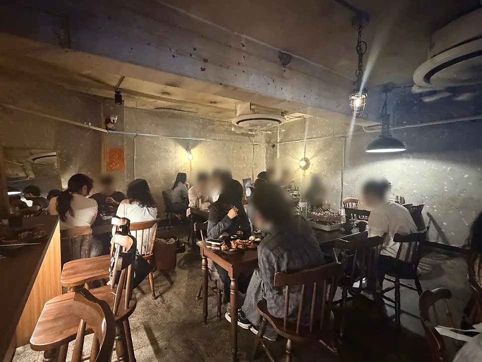 Jojomomo's interior with antique furniture and soft lighting