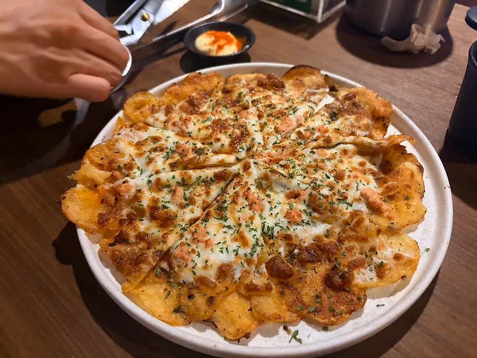 A full plate of pollock roe cheese potato jeon at Jojomomo