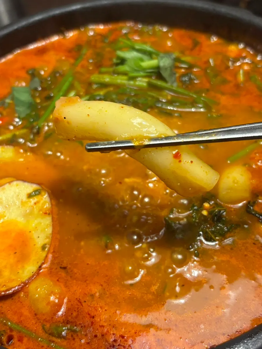 Mul dakgalbi broth with rice cake noodles added