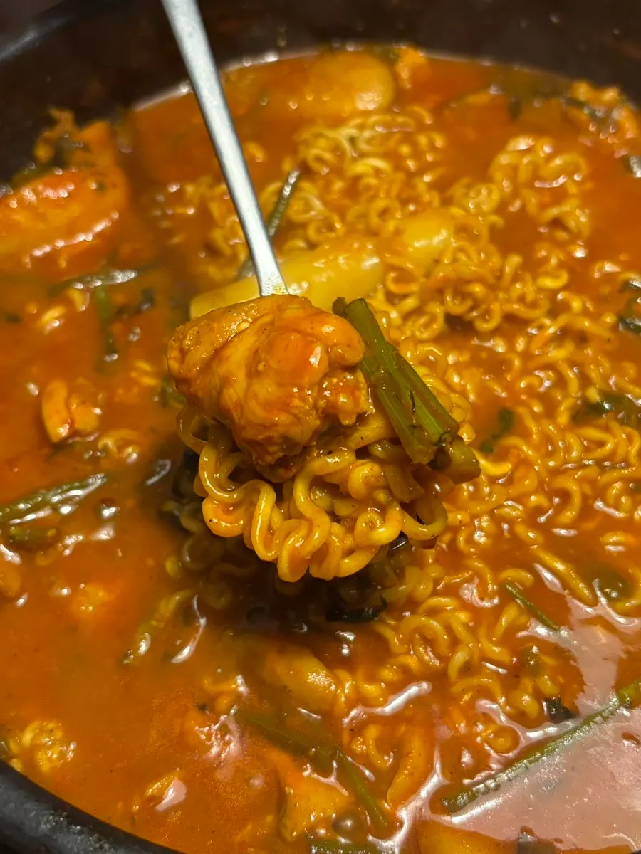 Ramen noodles cooked in the reduced broth