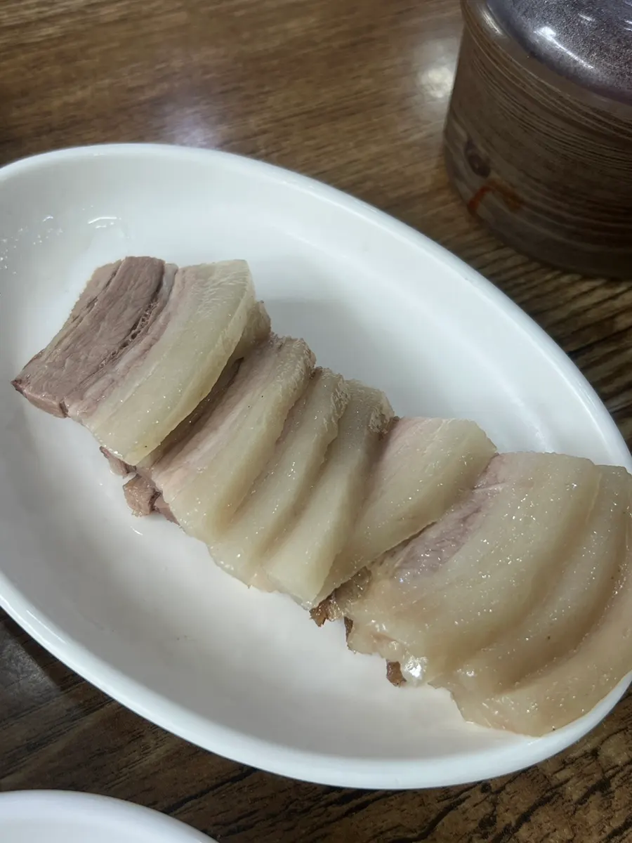 A bowl of mixed gukbap loaded with organs and meat