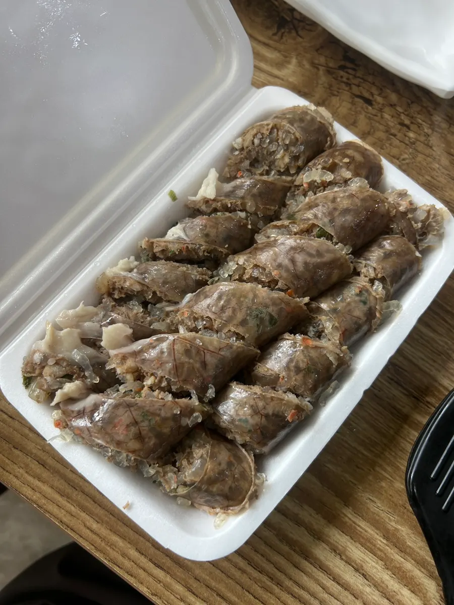 Fresh lettuce leaves served alongside the suyuk