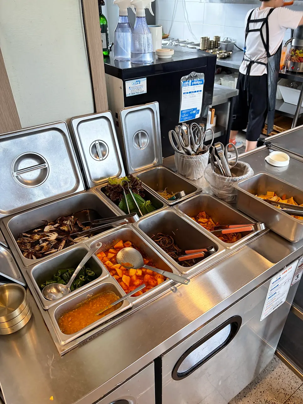 Soy-marinated crab and side dishes available self-serve