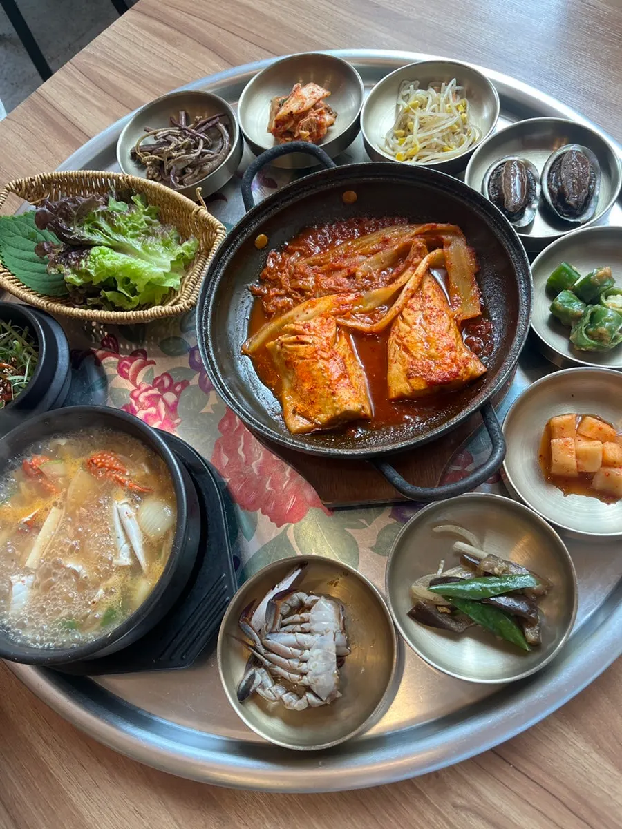 The Jeju set meal laid out as a 13-dish spread