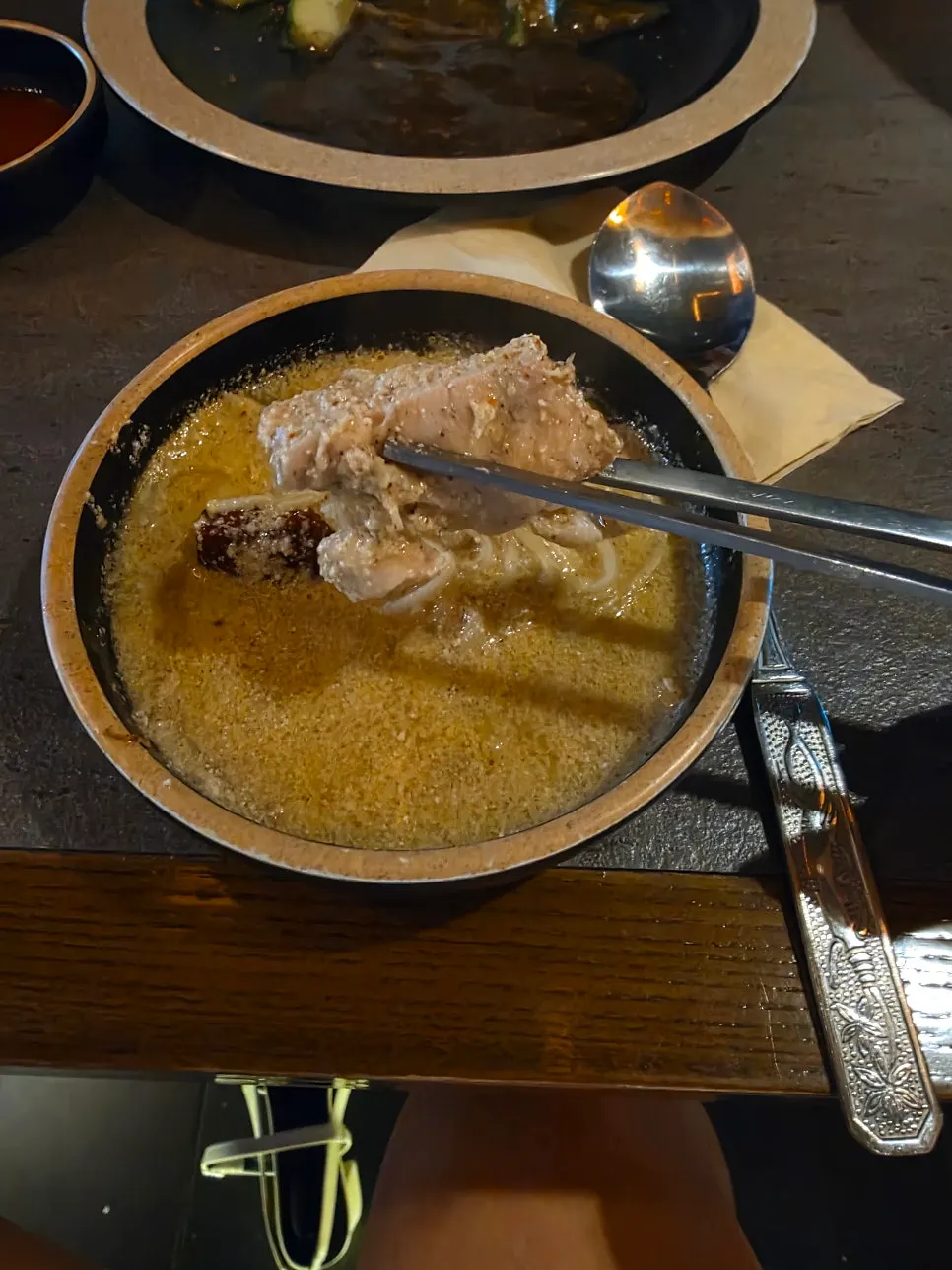 A bowl of perilla chicken hot pot plated