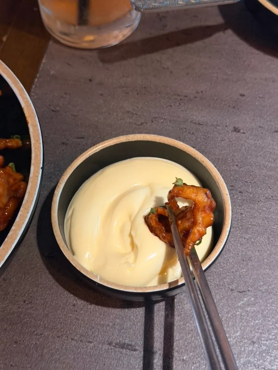 A mildly spicy piece of rice cake chicken feet stir-fry