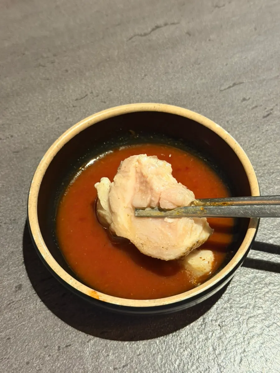 Chicken breast cooked shabu-shabu style in the broth