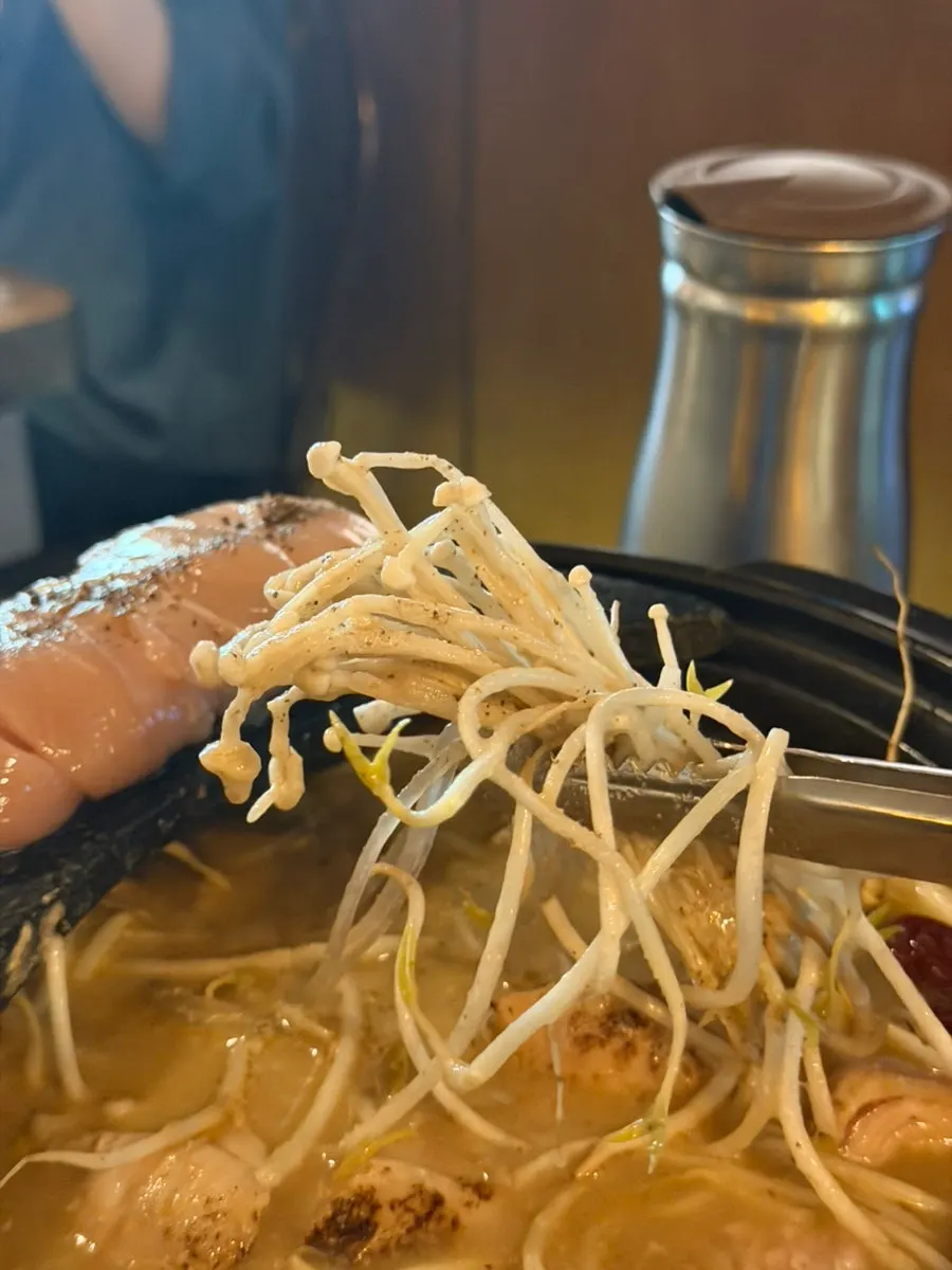 Chicken thigh meat and vegetables packed inside the hot pot