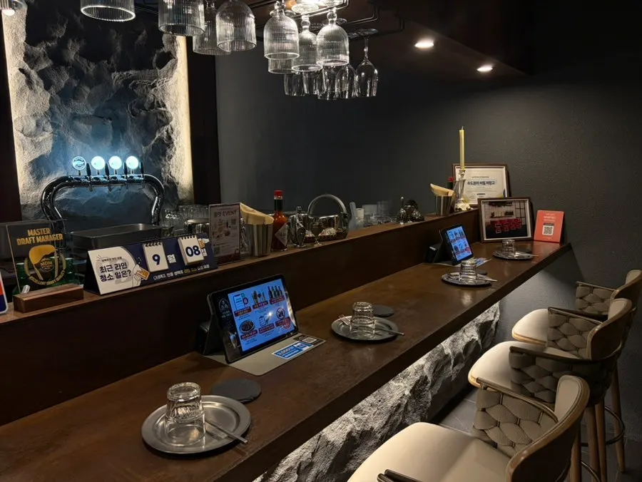 Interior of the basement bar with bar tables