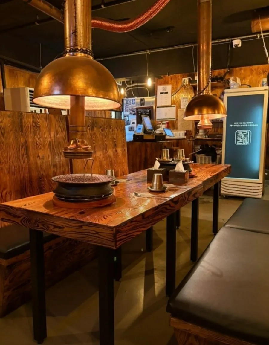 Korean BBQ seating under warm lighting