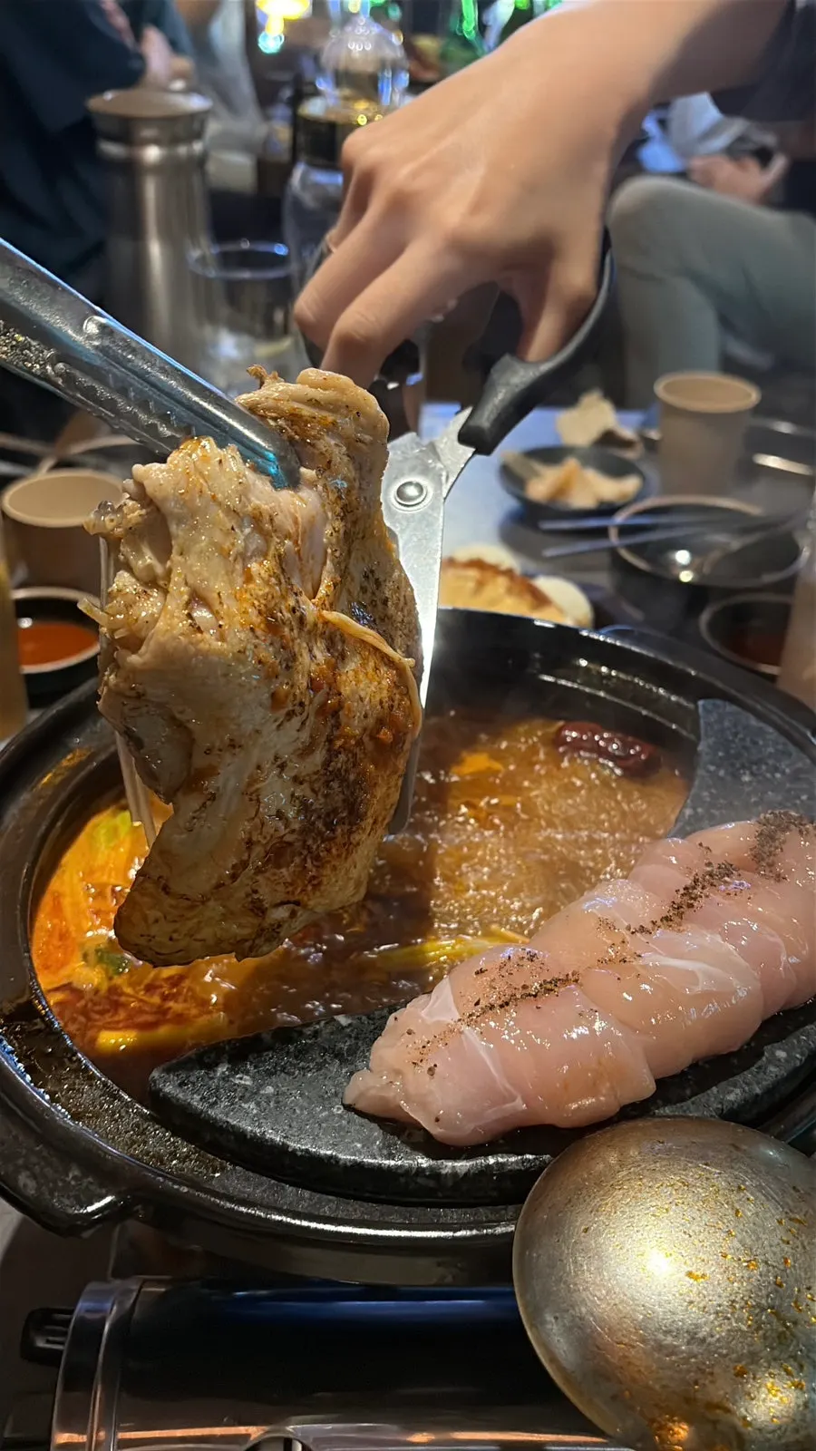 Chicken hot pot broth and chicken boiling