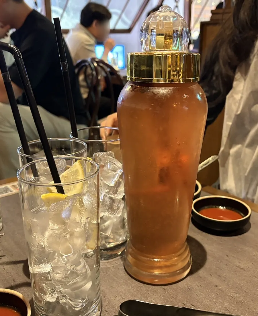 A bottle of omija liqueur highball ordered for the table