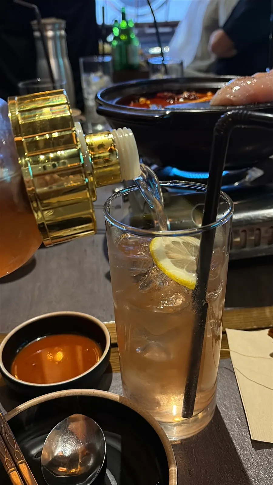 Omija liqueur highball poured into a glass