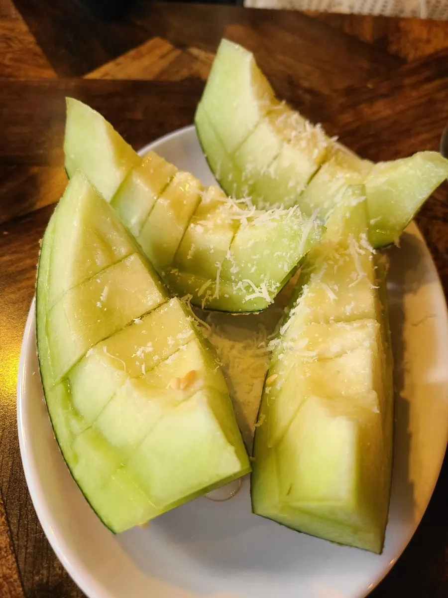 Half melon menu item at Didi's Pizza Pub