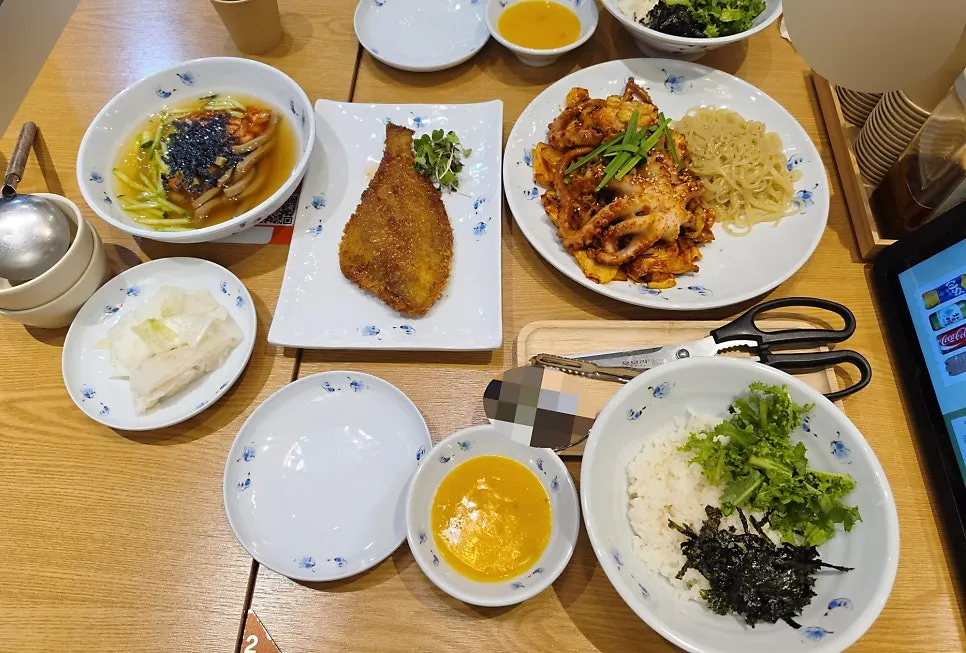 Full hyeja table with multiple dishes laid out