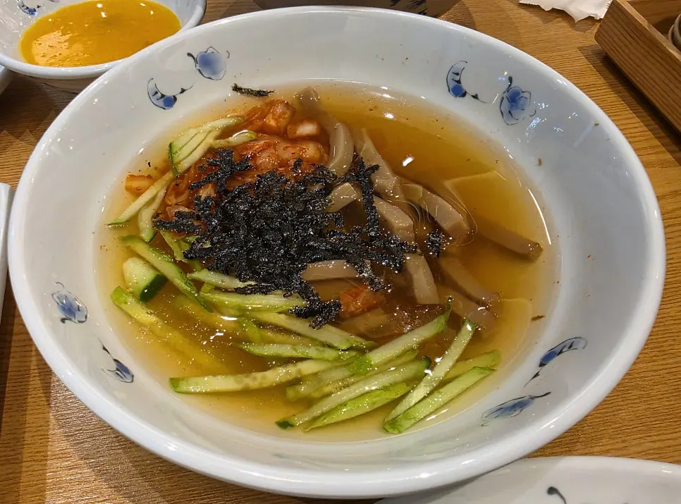 A bowl of mukbap with cool broth