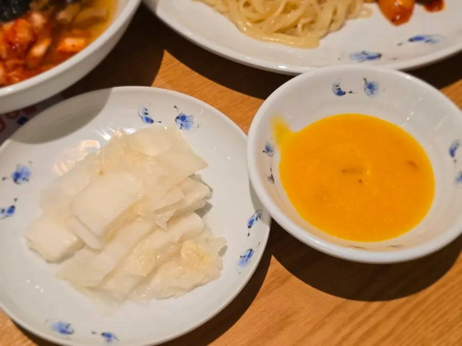 Sweet pumpkin porridge and napa cabbage white kimchi side dishes