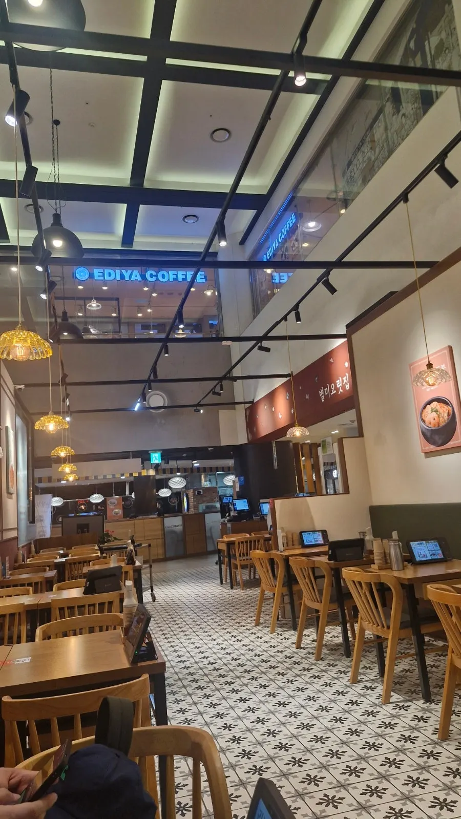 Open ceiling and antique lighting fixtures inside Bonghyejane Jubang