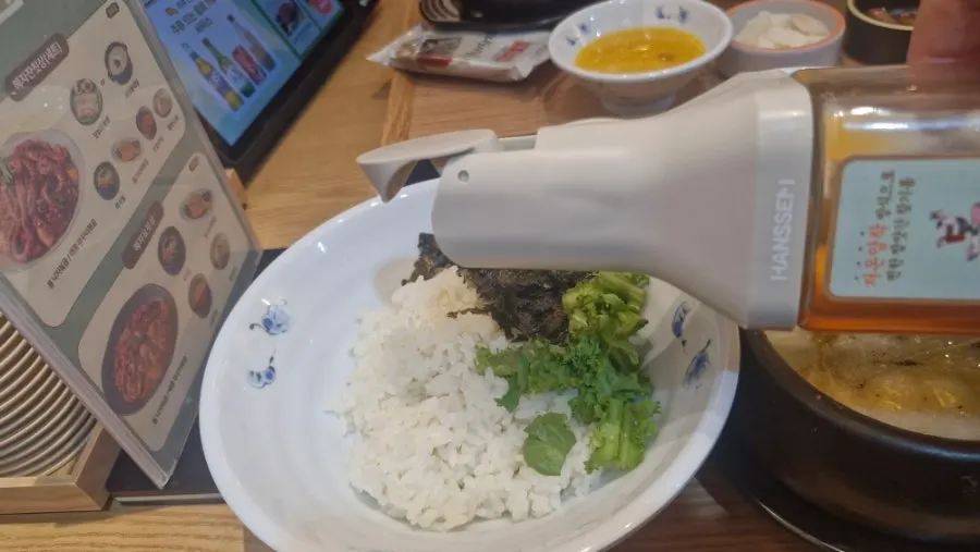 Rice mixed with sesame oil and octopus stir-fry