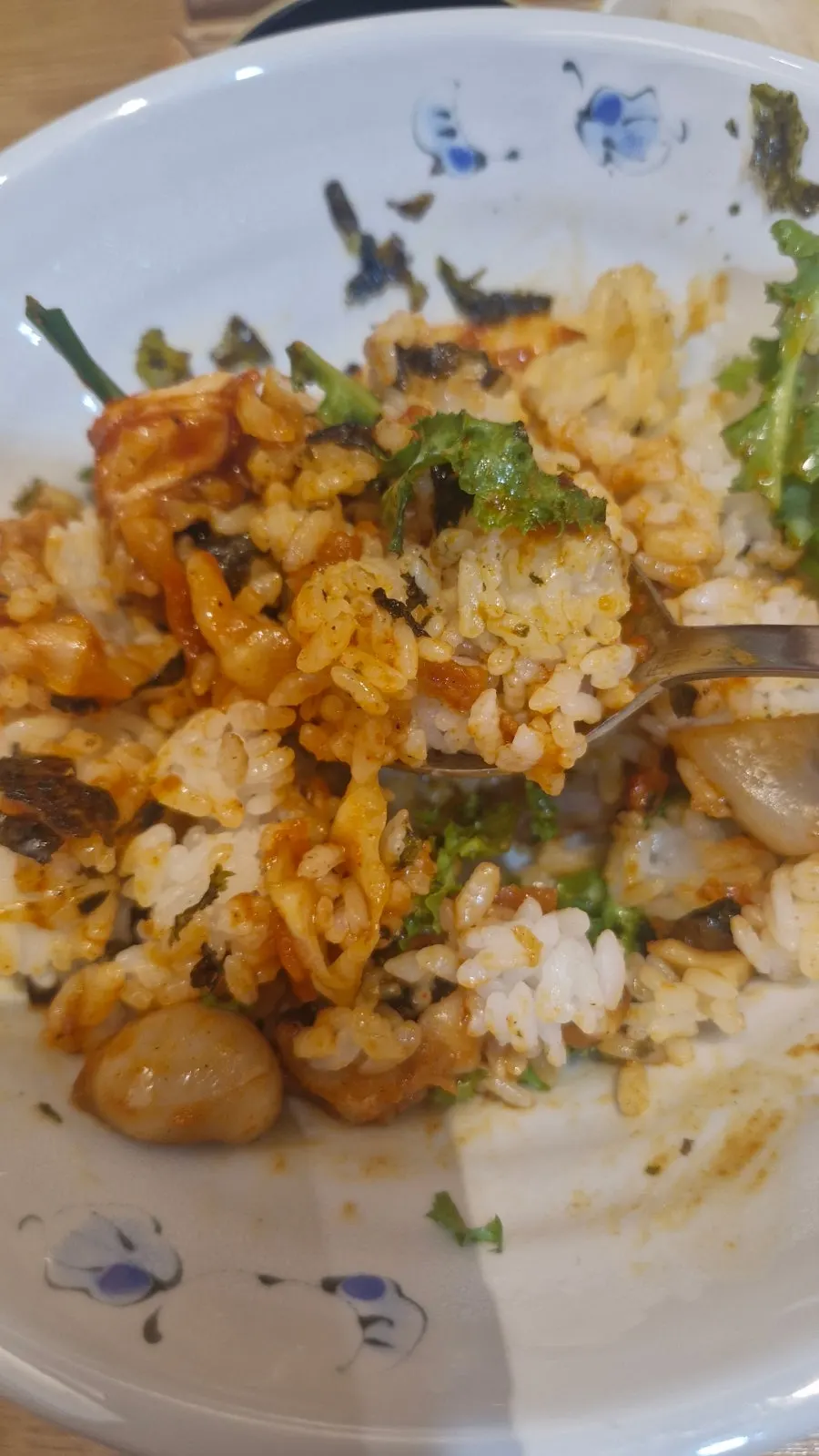 Mild-spiced octopus stir-fry served with rice