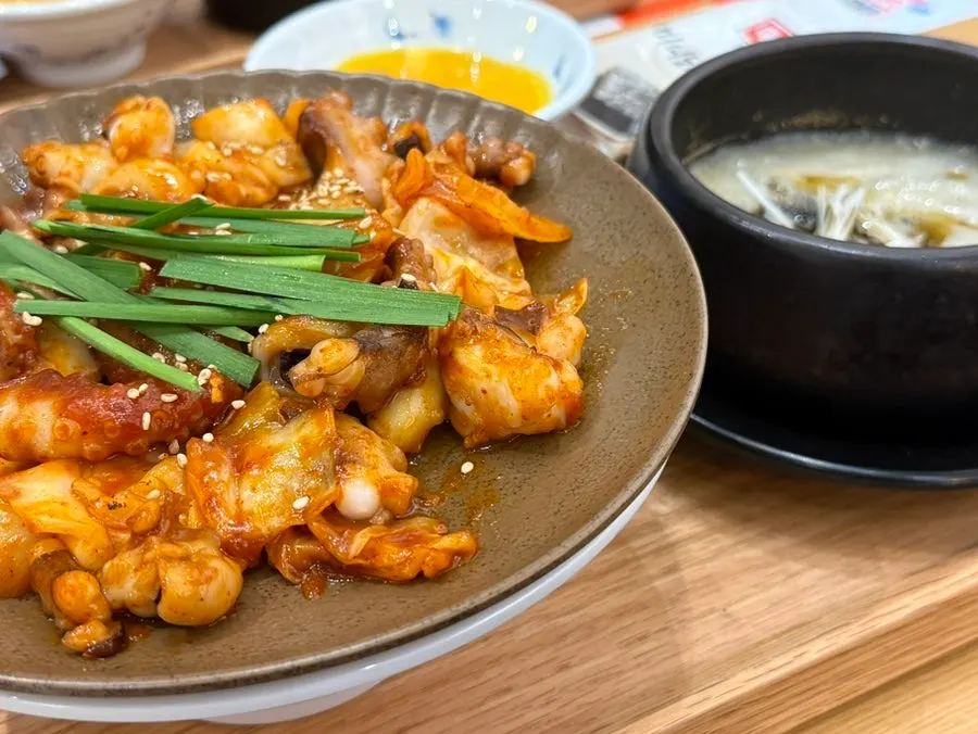 Table setting of two octopus stir-fry set meals