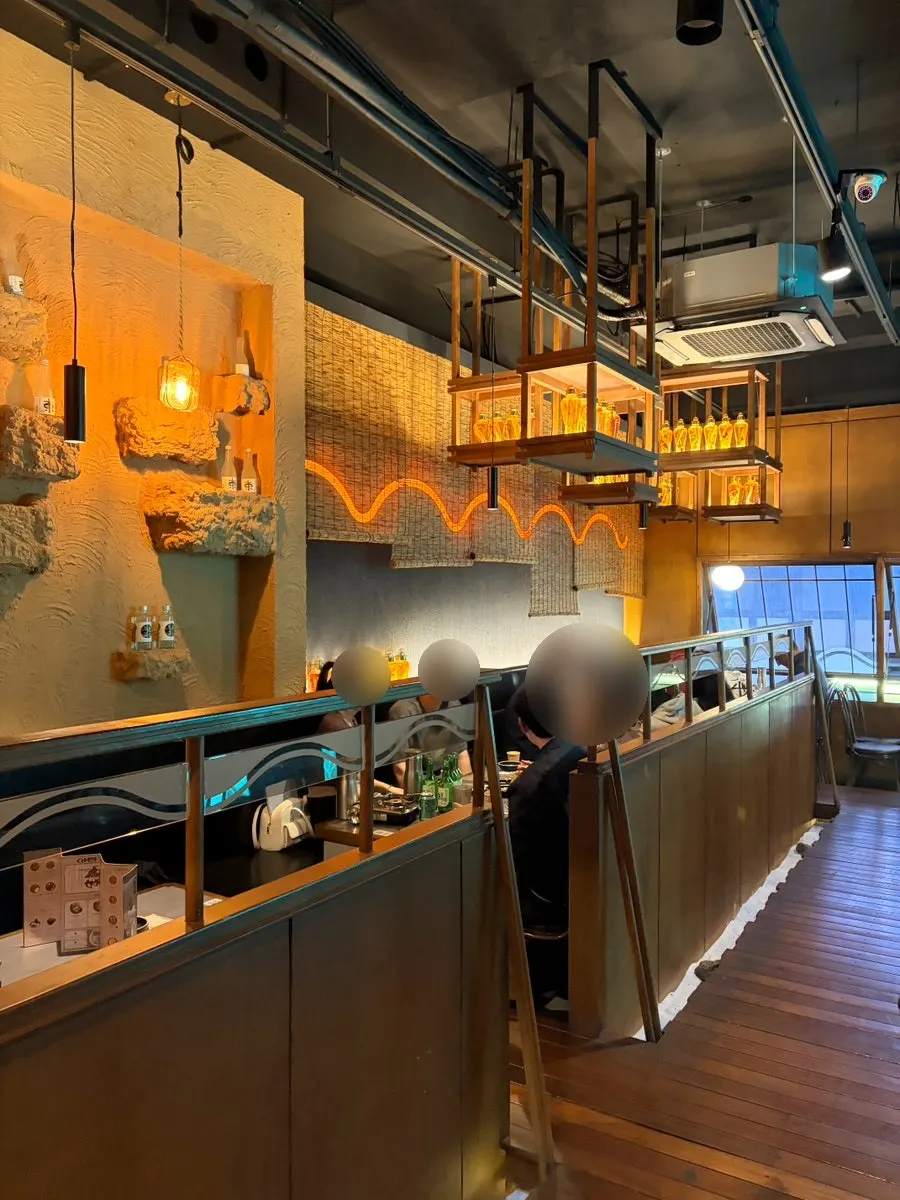 2nd floor seating with a Korean bar atmosphere at Ari Gyegok Jonggak