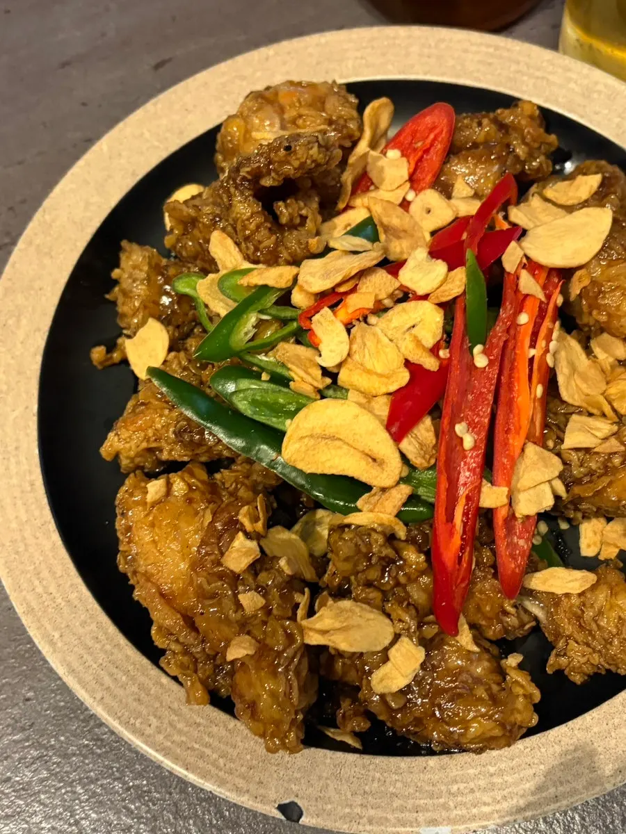 Black garlic fried chicken glazed in soy sauce