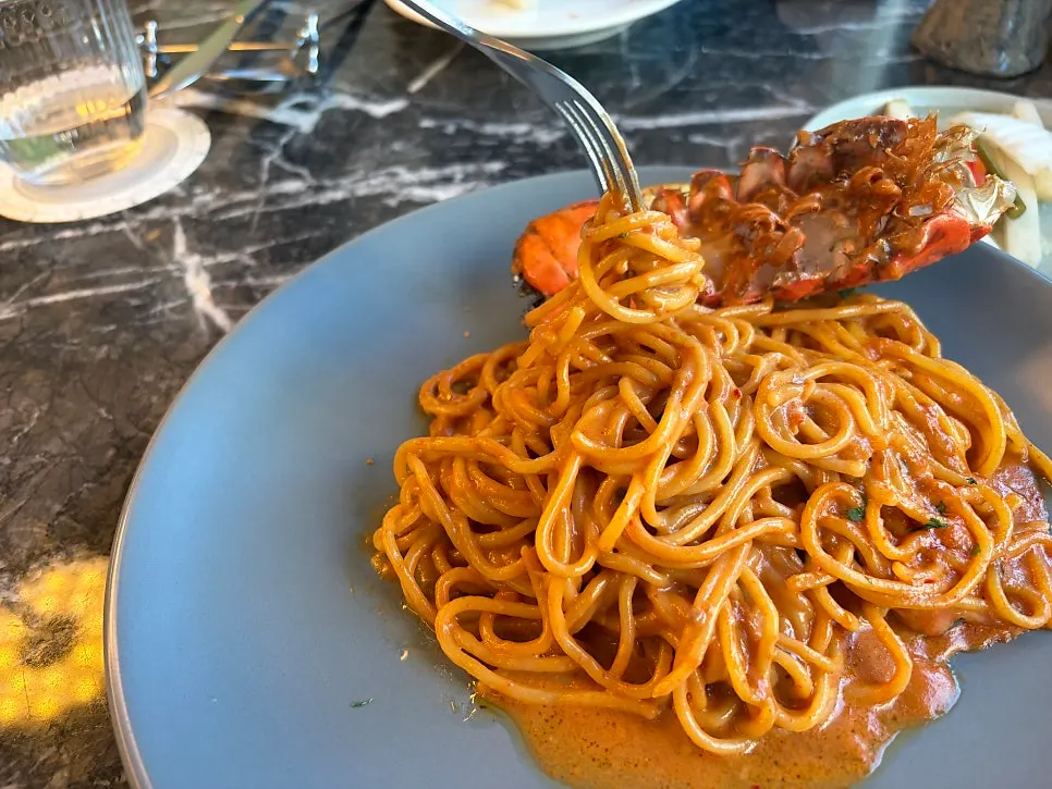 Lobster pasta and steak meal