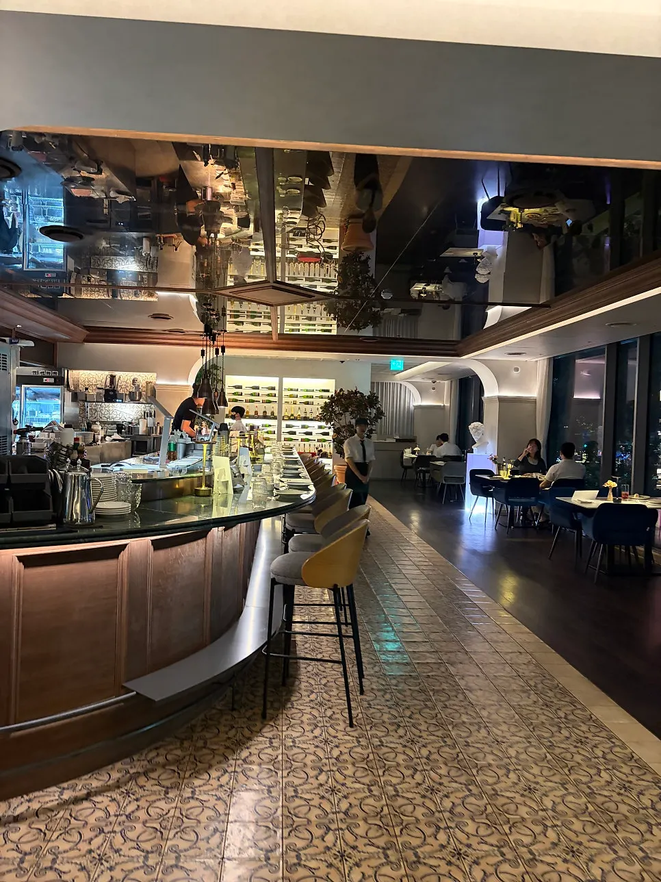 Window-side restaurant with evening lighting