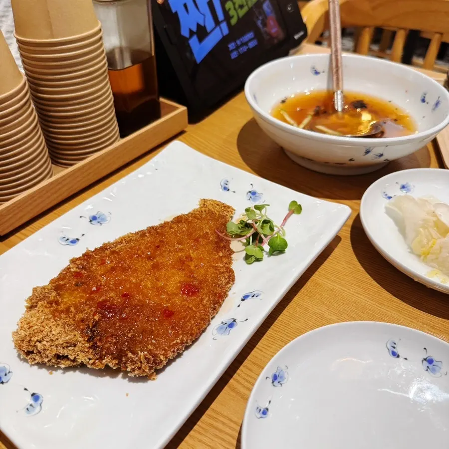 Whole flounder fry coated in sauce