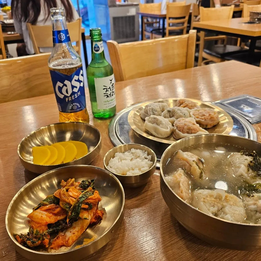 Mandu hot pot with clear broth simmered from hwangtae