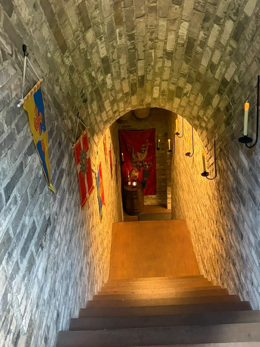 Basement entrance styled like a medieval monastery
