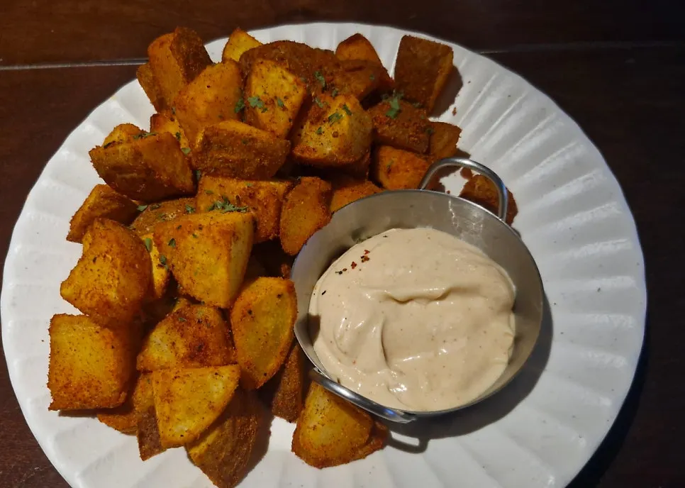 Secret Potatoes coated in spicy seasoning