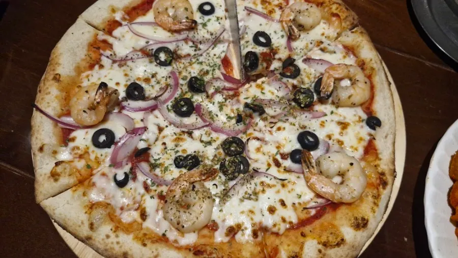 Seafood pizza with stretchy cheese