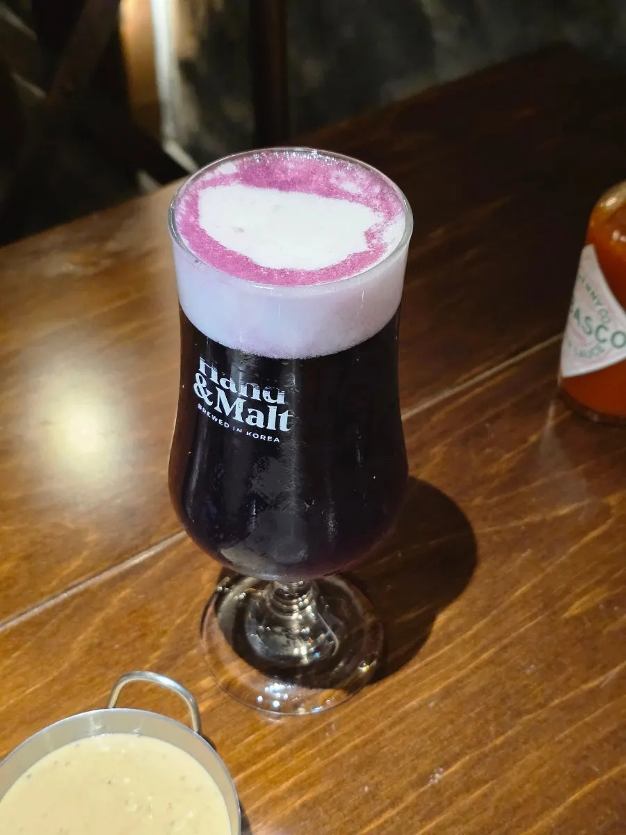 Ube beer and snacks on the table